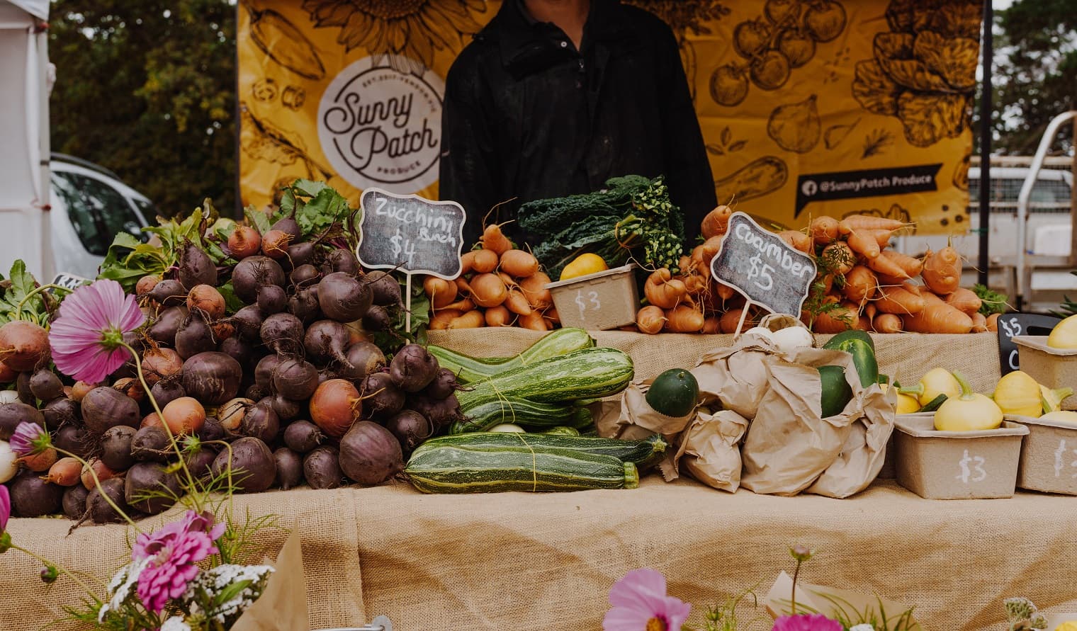 A market stall filled with vegetables