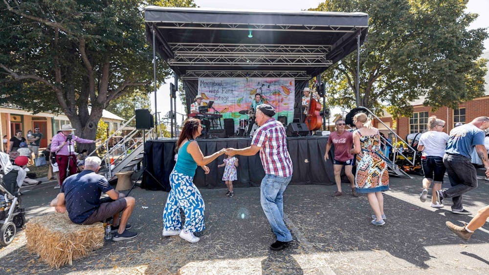 A couple enjoying the live entertainment at the Ballan Autumn Festival Main Stage