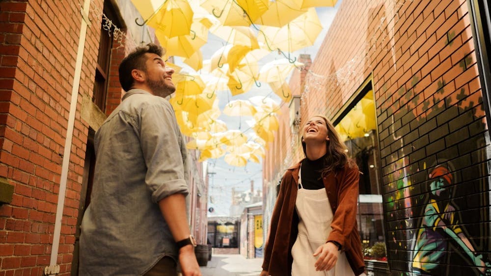 Couple wander down Hop Lane