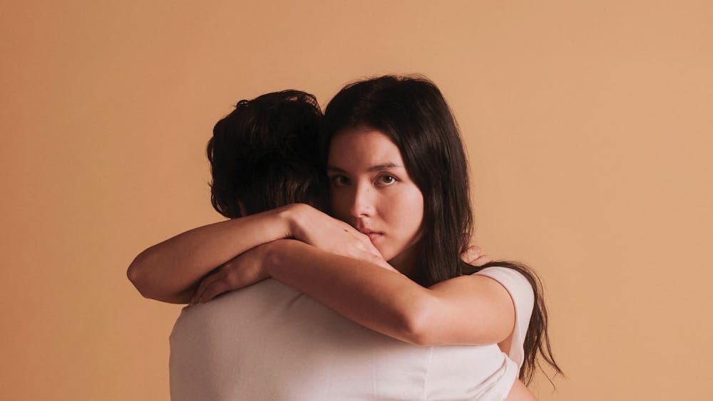 Juliet embracing Romeo