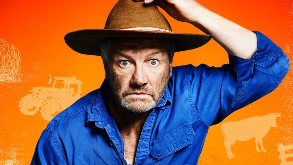 Lawrence Mooney dressed like a farmer