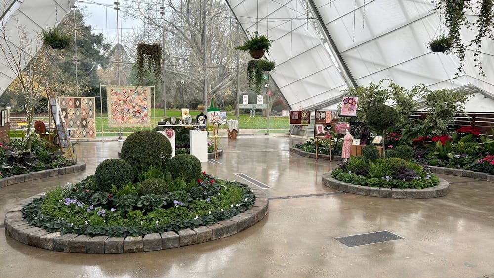 Conservatory with craft stalls and displays