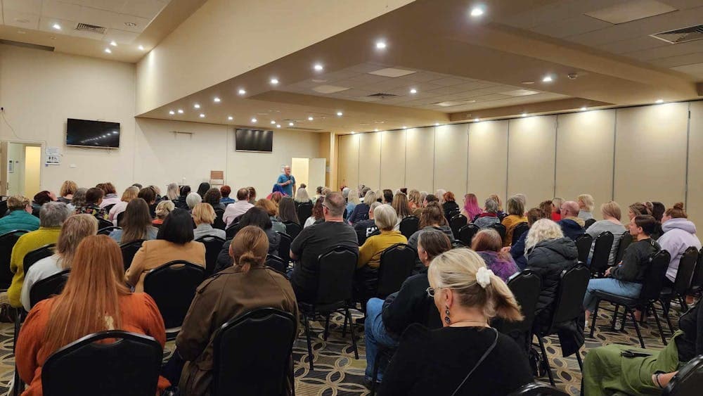 Aussie medium, Simon Hay sharing messages from spirit with an audience