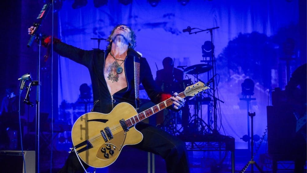 Tim Rogers up to his usual stage antics for You Am I