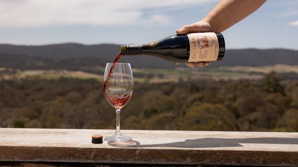 Pouring red wine