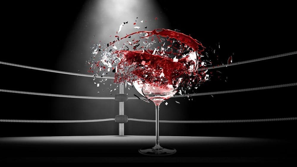 A wine glass is exploding inside a boxing ring