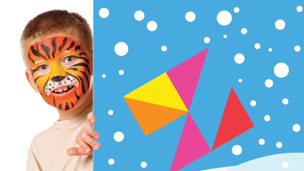 a child with his face painted like a tiger
