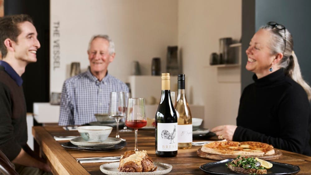 people enjoying wine and food at Fossickers Fine Food & Eatery