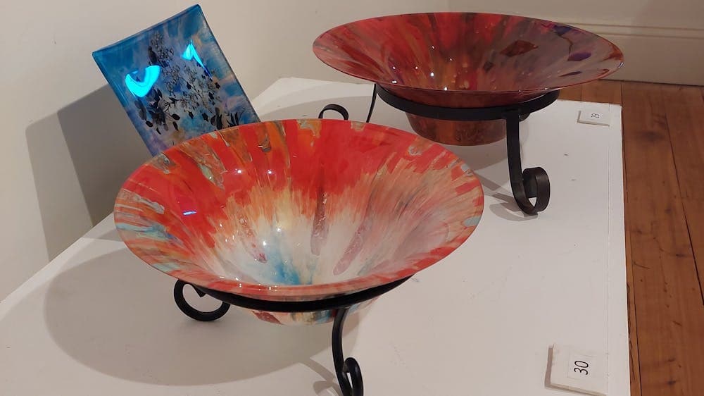 Collection of three acrylic paint pours in autumn tones