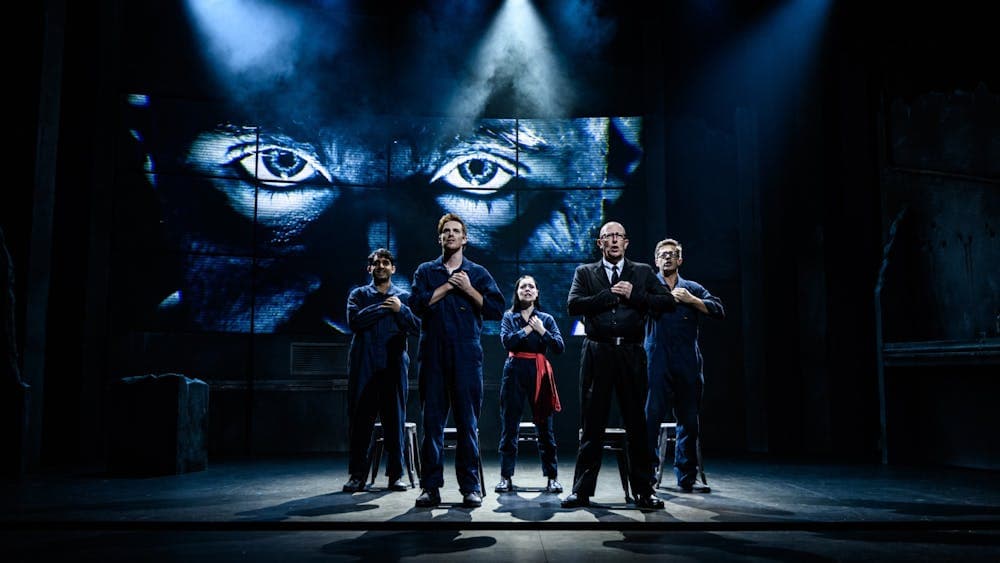 the cast declaring allegiance to The Party