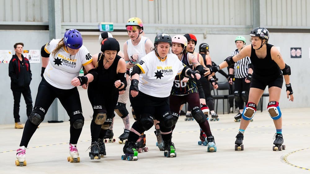 BRDL Team members playing in a moderate contact Roller Derby game