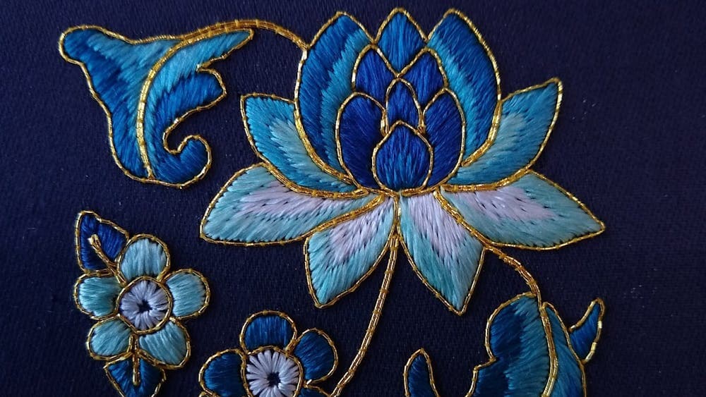 Floral embroidery in blue