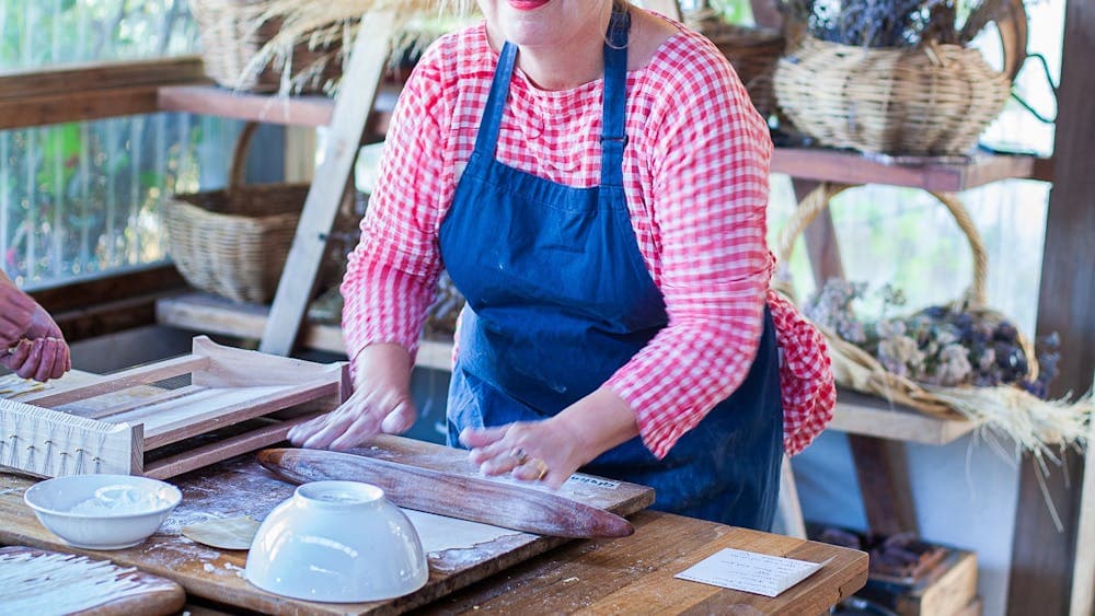 Woman rolling dough