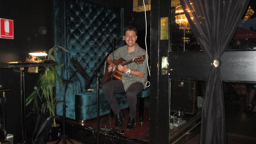 Man holding a guitar