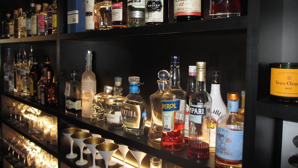 Shelves with bottle of spirits