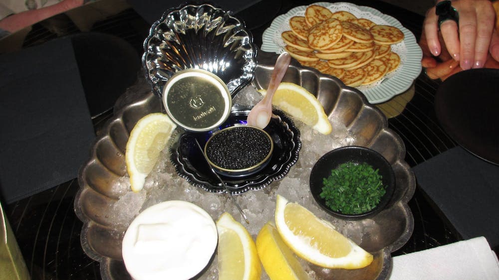 Picture of plate of caviar and condiments
