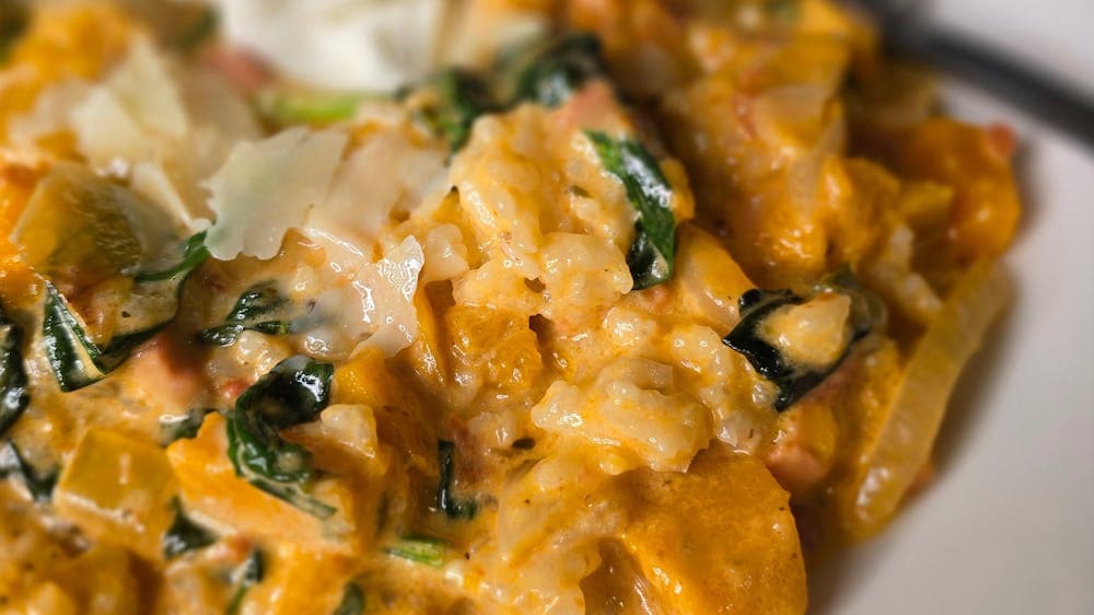Creamy pumpkin and spinach risotto served with Meredith’s goats cheese.