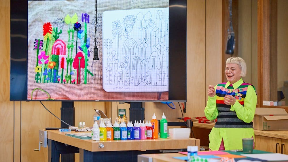 A picture of artist Morag Myerscough hosting a community workshop