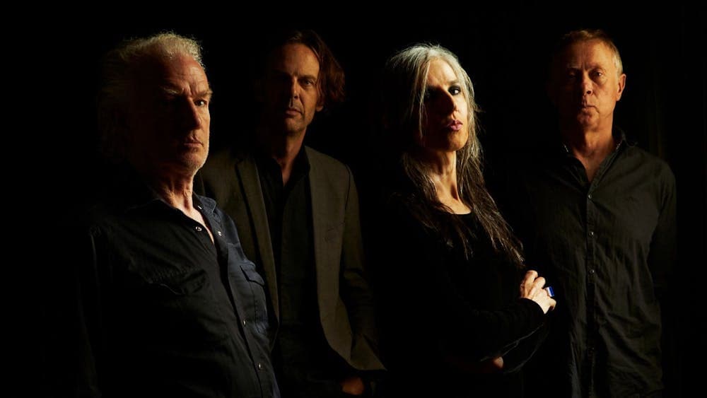 An atmospheric and brooding photo of the members of Bleak Squad.