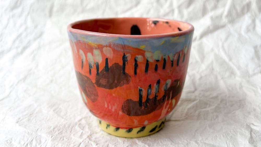 Slip cast colourful landscape cup