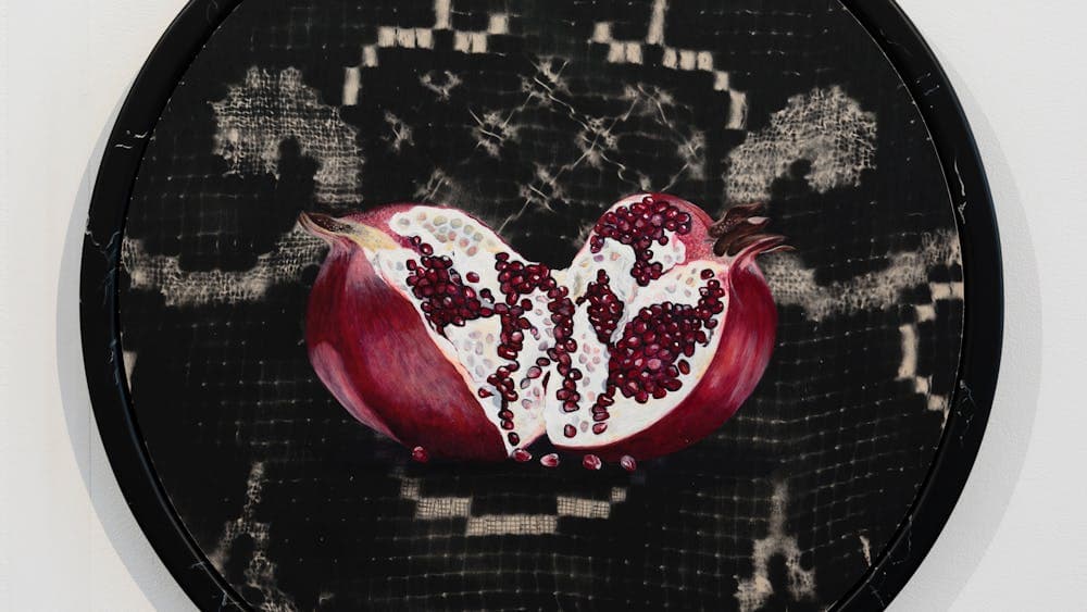 Acrylic, oil and automotive paint on ply . Diameter 540mm