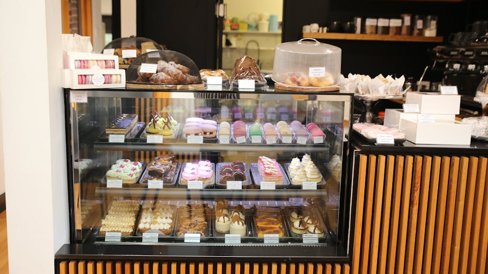 cakes on display at a counter