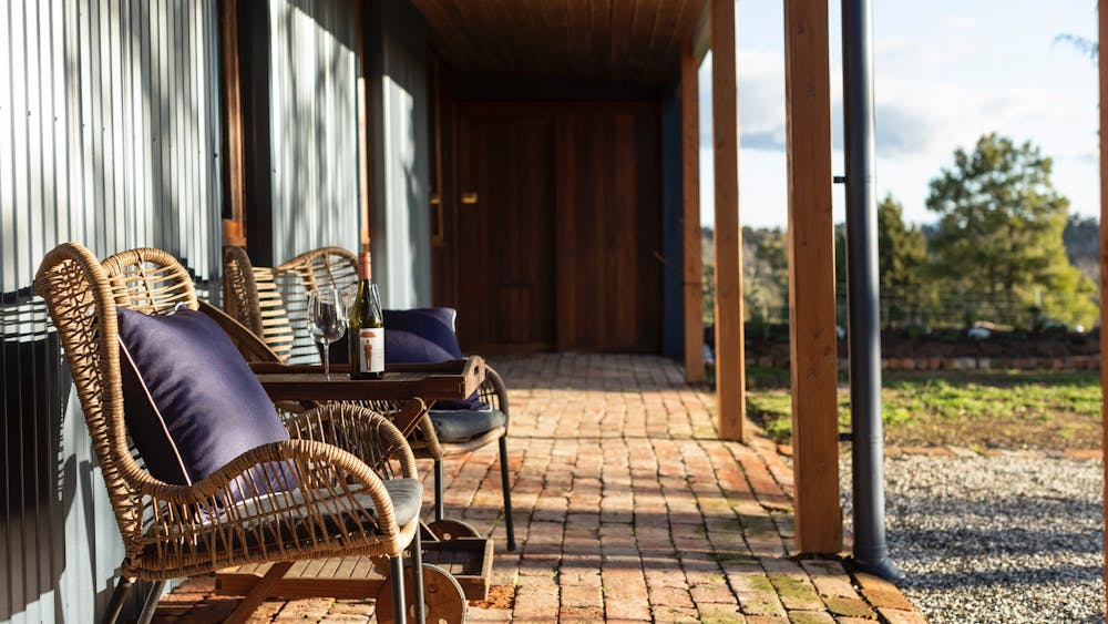 Outdoor cane chairs in the afternoon sunshine