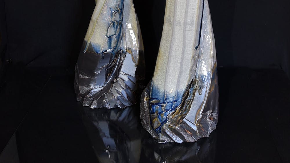 Tall twisted black and white vases