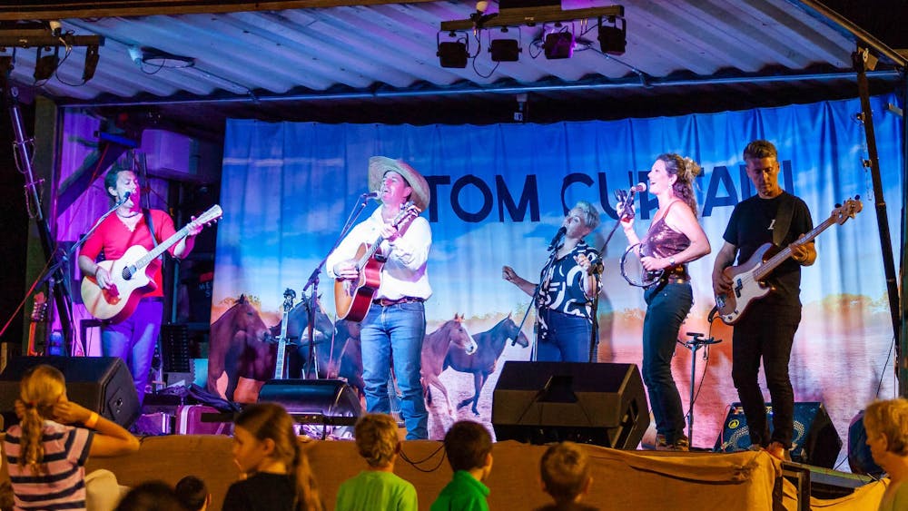 Singer songwriter performing on stage