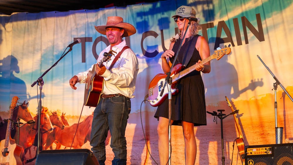Tom Curtain and Melissa Fraser on stage