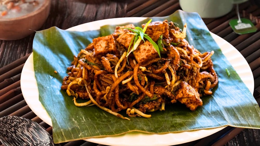 Authentic Malaysian mee goreng noodles served on a banana leaf at Jalan Jalan Eats Ballarat.