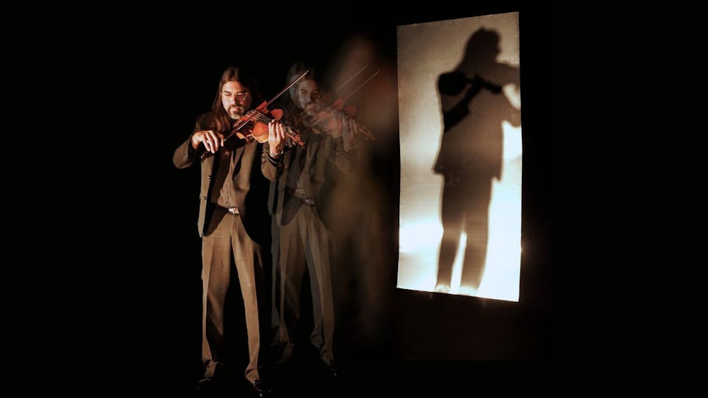 Composer and Performer Aaron Wyatt playing Viola