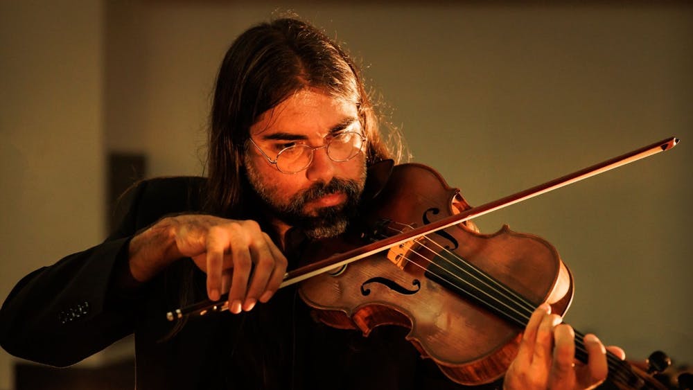 Composer and Performer Aaron Wyatt playing Viola