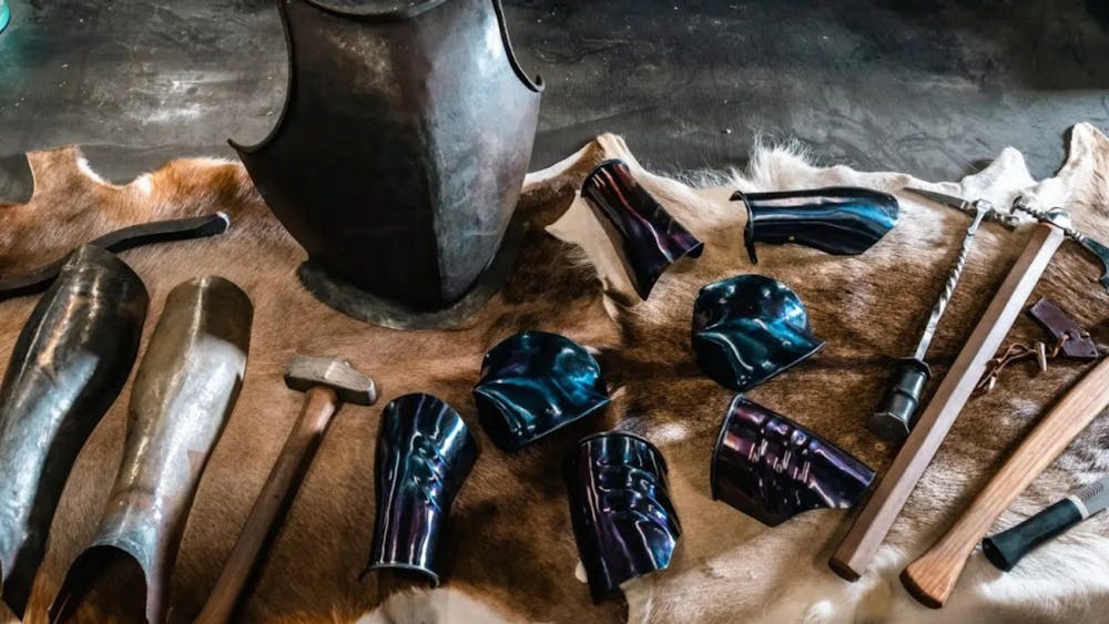 Armoury on display on animal skin on table