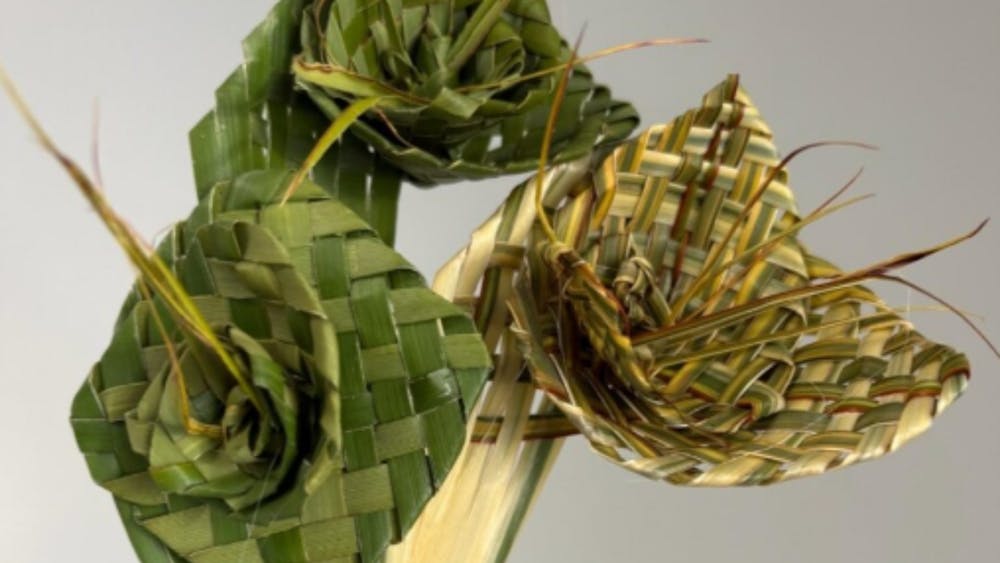Handwoven flowers made from natural fibres