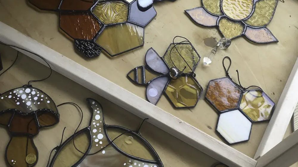 Stained glass panels on workbench