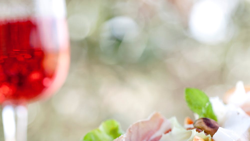 Rose with Proscuitto and Peach salad