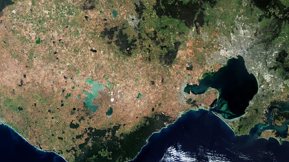 a colour photograph of victoria  and port phillip bay from space