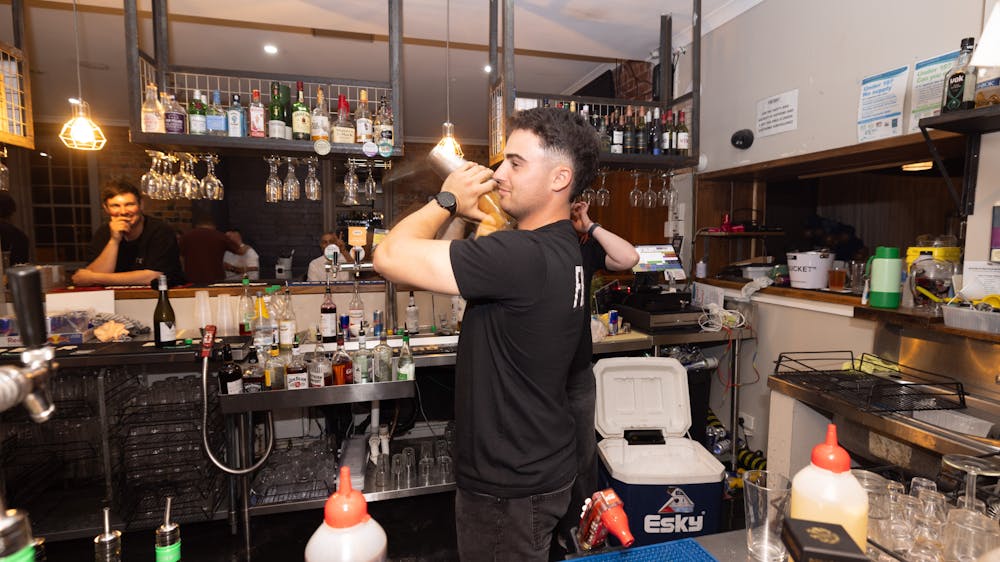 Freight Bar staff mixing cocktails during the Labour Day Eve 8 Hour Party.