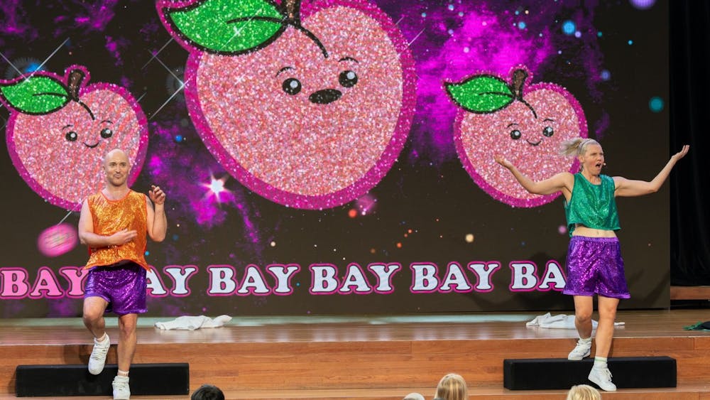 Play Date on stage at Fed Square in colourful outfits