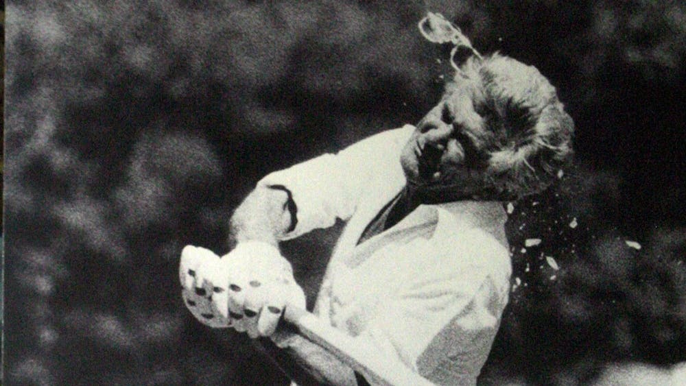 Photo of Bob Hawke playing cricket