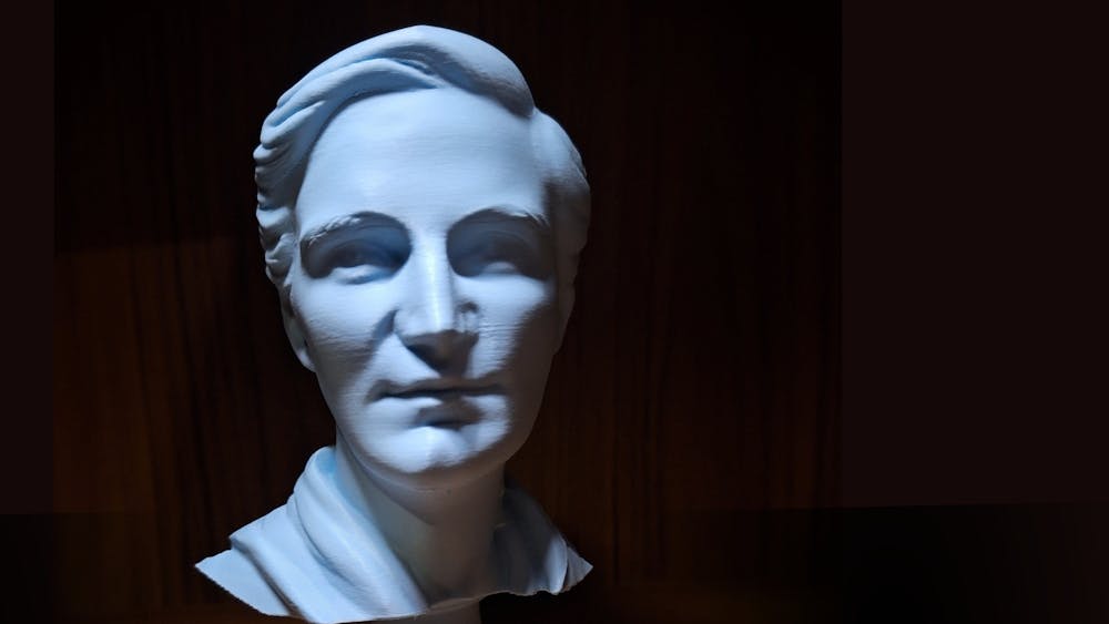 A light blue 3d Printed bust of queer poet Alieen Palmer