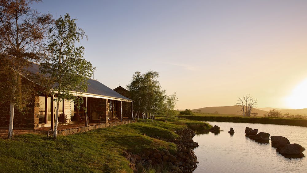 Hand-built bluestone cottages, offering privacy amid native farm and bushland.
