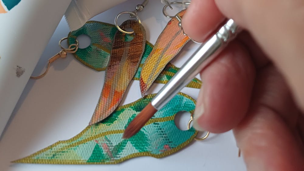 Painting gum leaf earrings