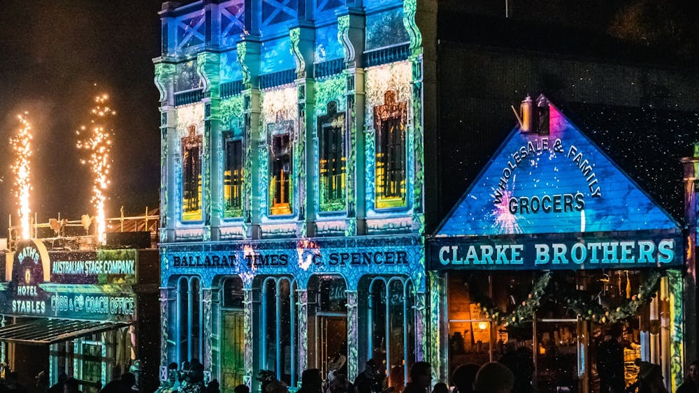 Buildings lit up with colourful projections at Sovereign Hill