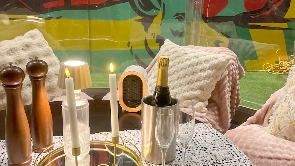 Winter Igloo with beanbag chairs, candles and wine