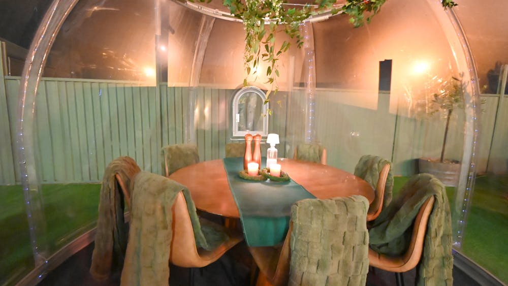 Cosy winter igloo with dining chairs & table