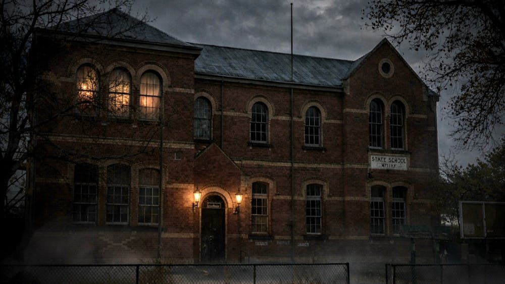 old school building on a misty winter evening