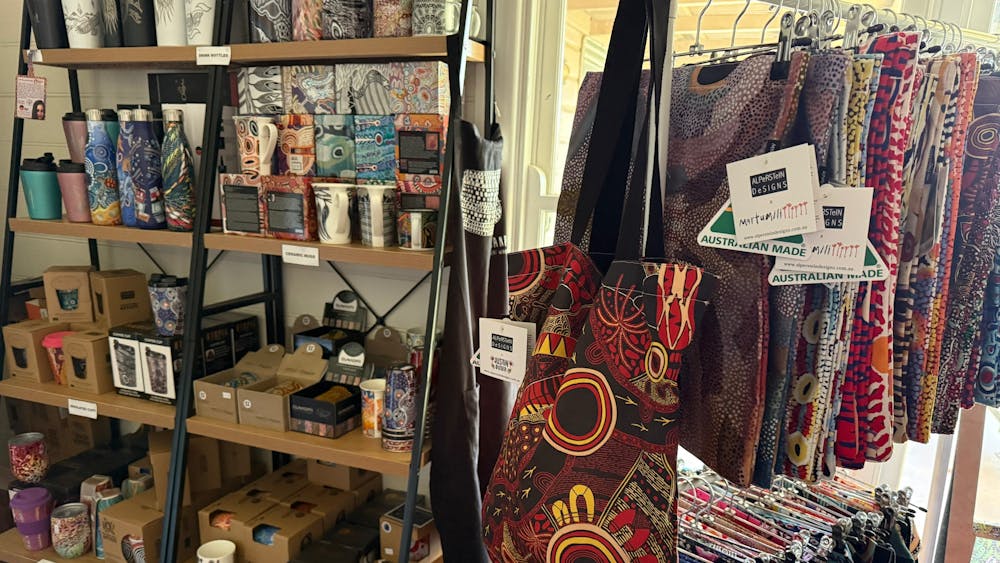 room filled with giftware with aboriginal  art on it