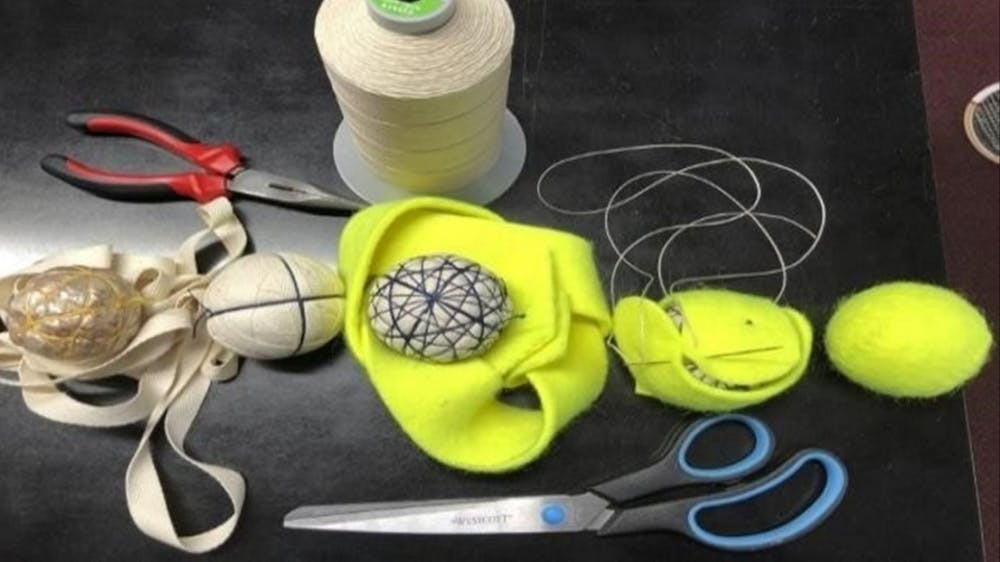 different steps in making a tennis ball with a scissor, thread and pliers